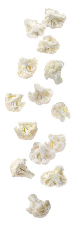 Many fresh cauliflower florets falling on white backgroundの写真素材