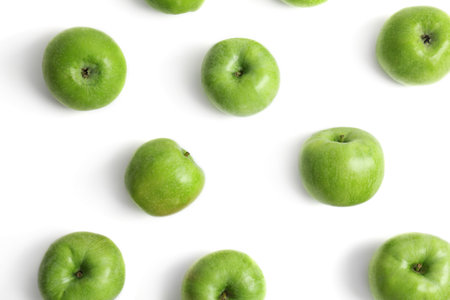 Fresh green apples on white background, top viewの写真素材