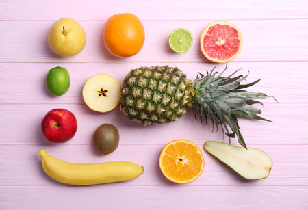 Set of fresh tropical fruits on color backgroundの写真素材