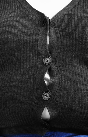 Overweight person in tight clothes, closeup