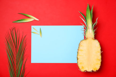 Fresh pineapple half on color background, flat layの写真素材