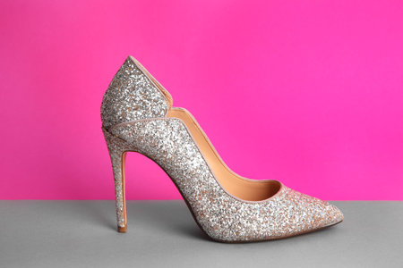 Female shoe on color backgroundの写真素材