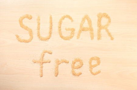 Phrase SUGAR FREE on wooden backgroundの写真素材