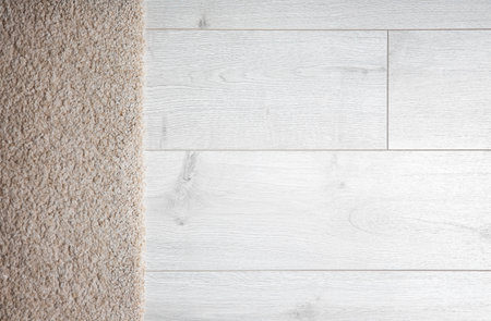 Light soft carpet on wooden floorの写真素材