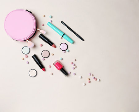 Decorative makeup products on color backgroundの写真素材