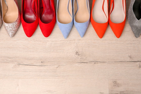 Different female shoes on floorの写真素材