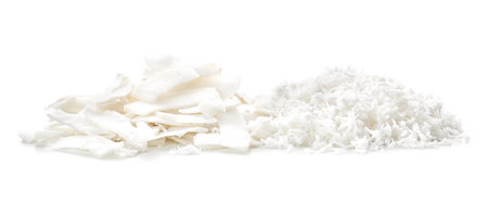 Fresh coconut flakes on white backgroundの写真素材