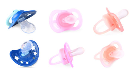 Collage of baby pacifiers on white background, views from different sidesの写真素材