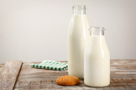 Bottles of milk on tableの写真素材