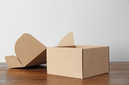 Cardboard box on wooden tableの写真素材