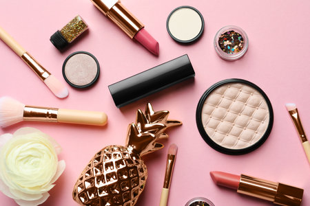 Flat lay composition with decorative cosmetics on color backgroundの写真素材