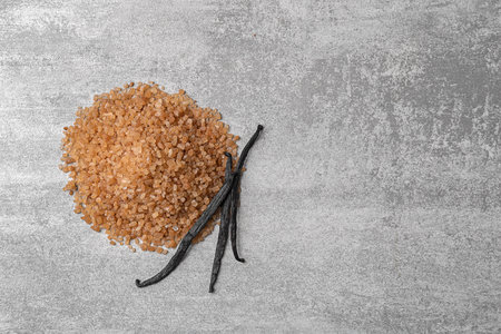 Aromatic vanilla sugar and sticks on gray backgroundの写真素材