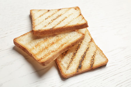 Toasted bread on light backgroundの写真素材