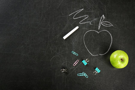 Flat lay composition for Teacher's day on chalkboardの写真素材
