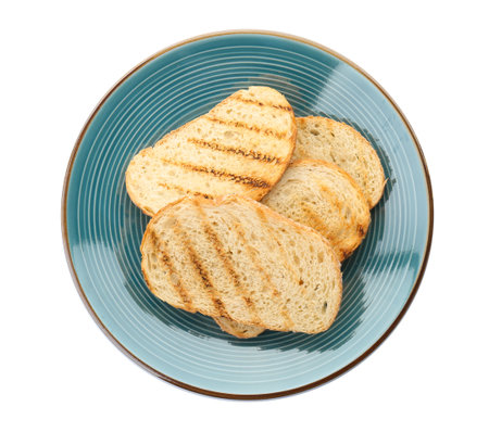 Plate with toasted bread on white background, top viewの写真素材