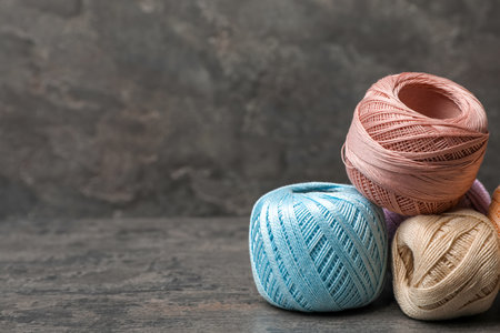 color threads on gray backgroundの写真素材