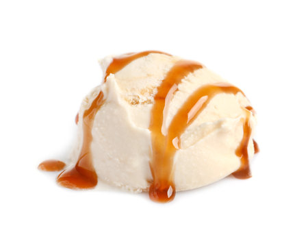Tasty ice cream ball with caramel sauce on white backgroundの写真素材