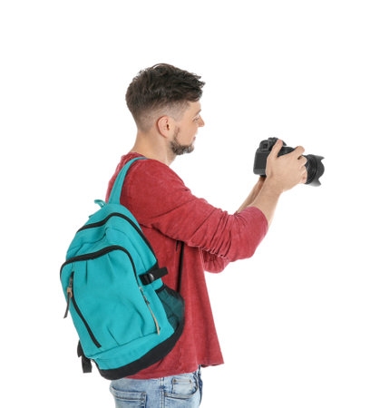 Male photographer with camera on white backgroundの写真素材