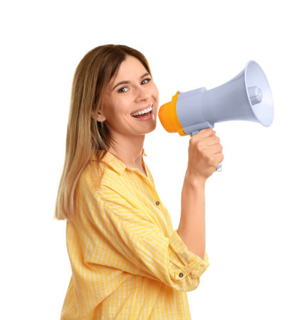 Young woman shouting into megaphone on white backgroundの写真素材