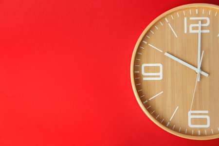 Big clock on color background. time change conceptの写真素材