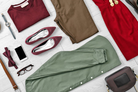 Flat lay set of stylish clothes and accessories on wooden floorの写真素材