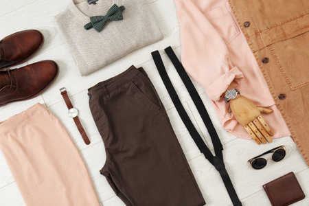 Flat lay set of stylish clothes and accessories on wooden floorの写真素材