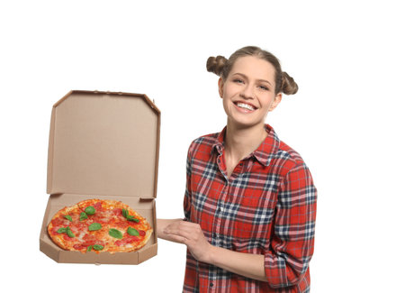 Attractive young woman with delicious pizza on white backgroundの写真素材
