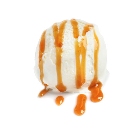 Tasty ice cream ball with caramel sauce on white backgroundの写真素材