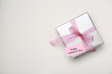 Elegant gift box for Mother's Day on light background, top viewの写真素材