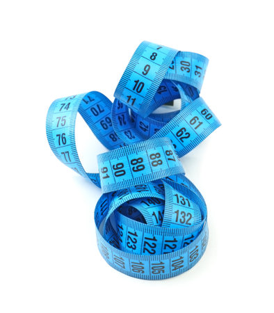 Measuring tape on white backgroundの写真素材