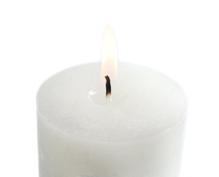 Burning wax candle on white background, closeupの写真素材