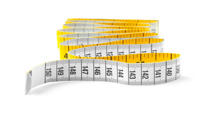 Measuring tape on white backgroundの写真素材