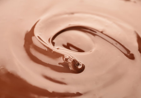 Delicious melted milk chocolate, closeupの写真素材