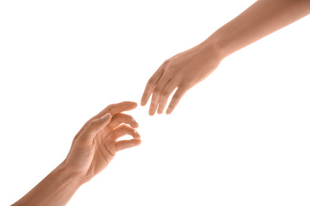 Man and woman reaching out to one another on light background. unity conceptの写真素材