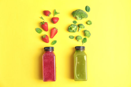 Flat lay composition with healthy detox smoothies and ingredients on color backgroundの写真素材
