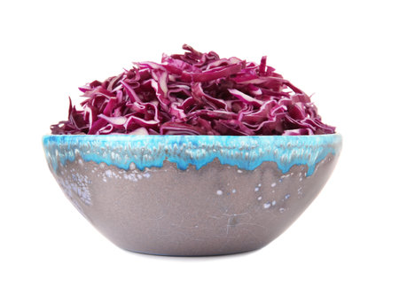 Bowl with chopped red cabbage on white backgroundの写真素材