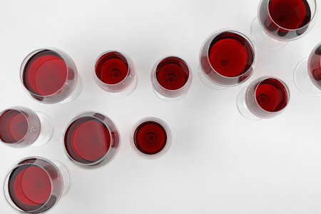 Glass of expensive red wine on light background, top viewの写真素材