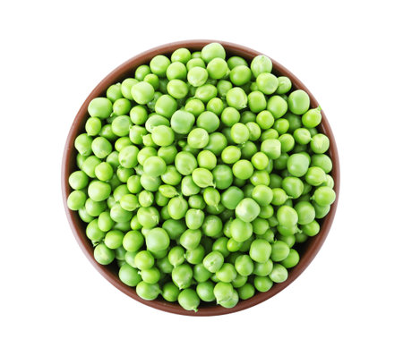 Bowl with green peas on white background, top viewの写真素材
