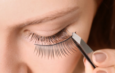 Attractive young woman with false eyelashes, closeupの写真素材