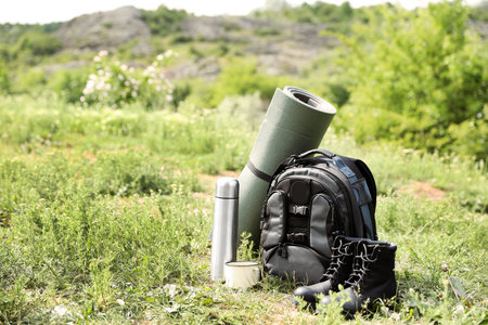 Set of camping gear outdoors on sunny dayの写真素材