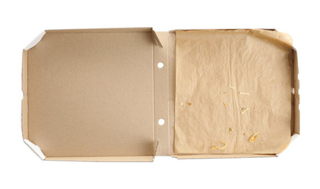 Open cardboard pizza box on white backgroundの写真素材