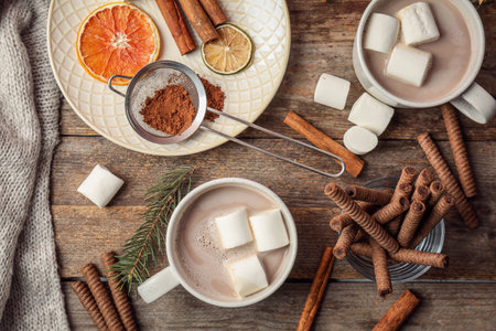 Flat lay composition with hot cocoa drink on wooden backgroundの写真素材