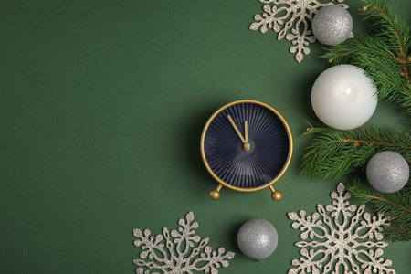 Flat lay composition with alarm clock and decorations on color background. christmas count down