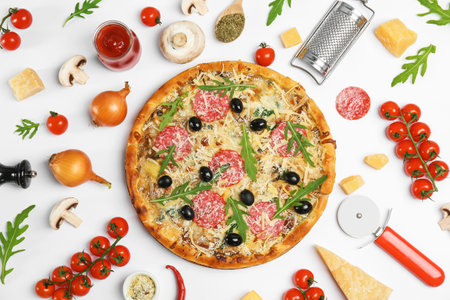Composition with delicious pizza and ingredients on white backgroundの写真素材