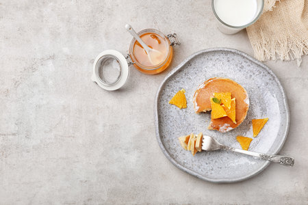 Flat lay composition with tasty pancakes on gray backgroundの写真素材