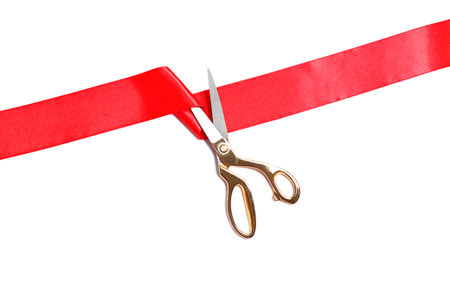 Ribbon and scissors on white background, top view. Ceremonial red tape cuttingの写真素材