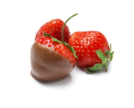 Delicious chocolate covered strawberries on white backgroundの写真素材