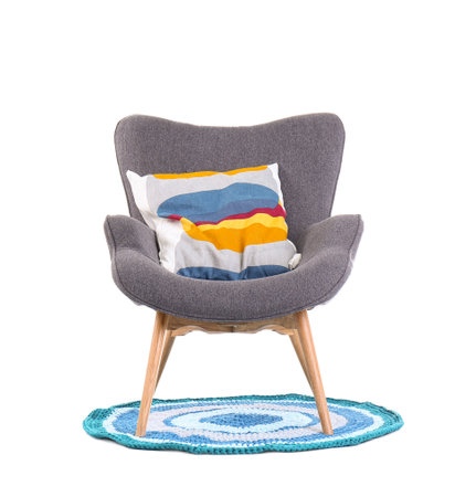 Comfortable armchair with pillow on white background. Interior elementの写真素材