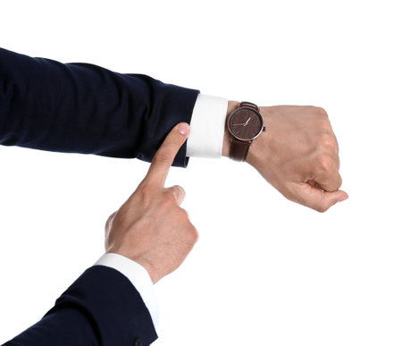 Businessman with wrist watch on white background. time conceptの写真素材