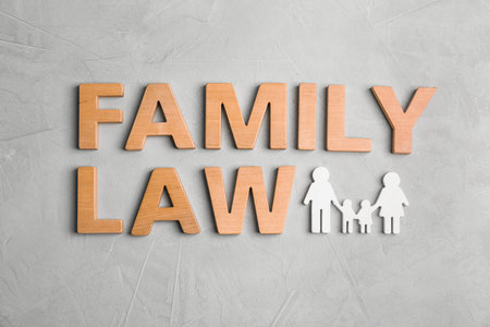 Flat lay composition with words FAMILY LAW on gray backgroundの写真素材